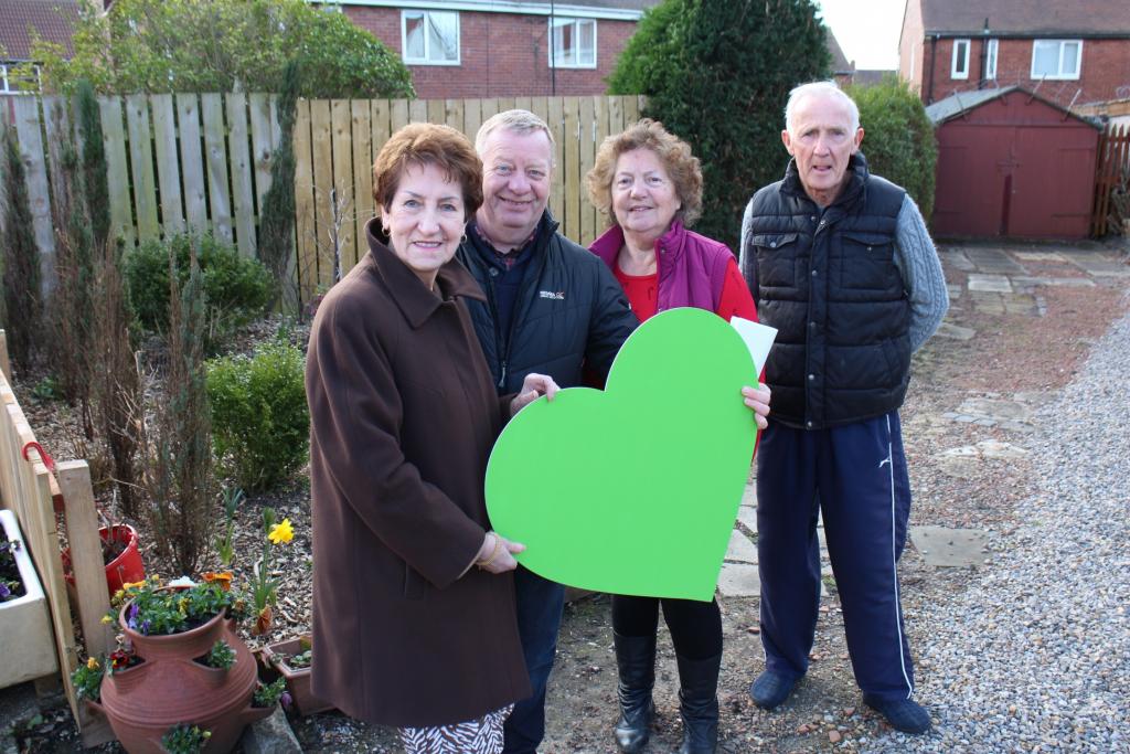 Michael Robson, middle-left, with Elected Mayor Norma Redfearn and some of his neighbours who helped him with the work on the area