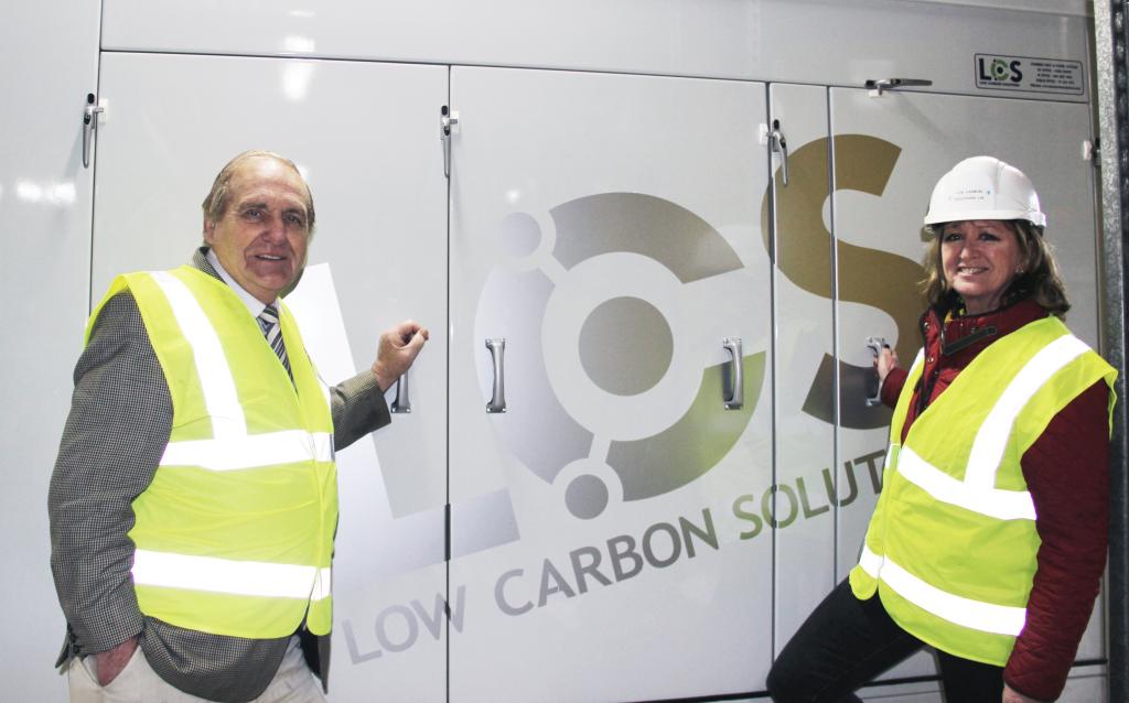 Cllr John Stirling, cabinet member for Sustainable Development, and Fiona Taylor, of Low Carbon Solutions with the Combined Heat and Power unit