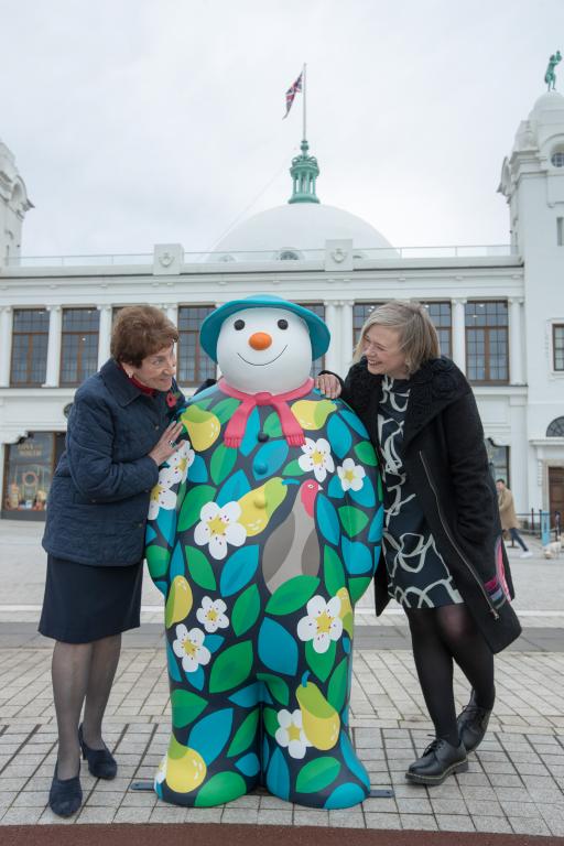 Elected Mayor, Norma Redfearn CBE, left, with artist Lisa Kirkbride, who designed the snowman