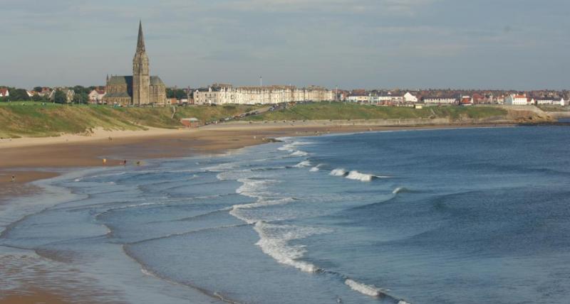 view of coastal town from beach 