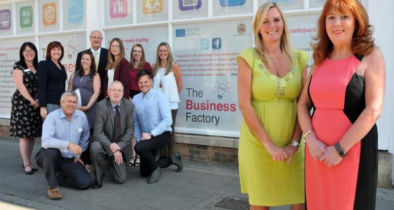 Foreground – Karen Westgate, left, Business Development Officer at North Tyneside Council, with Carole White, CEO at TEDCO Business Support. Background – Advisers from The Business Factory and TEDCO.