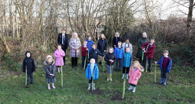 St Columba’s Primary School tree planting event with guests