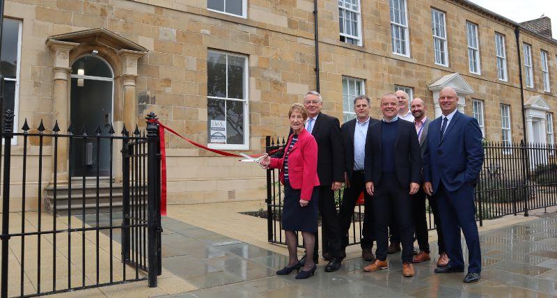 The Elected Mayor and the project team outside the front door of 11-12 Northumberland Square 