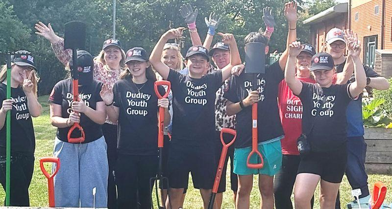 Members of Dudley Youth Group at work on the gardening project